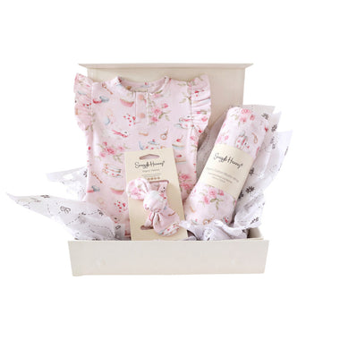 Snuggle Hunny Classic Alice’s Tea Party gift hamper in a cream gift box with organic frill bodysuit, topknot and print muslin wrap