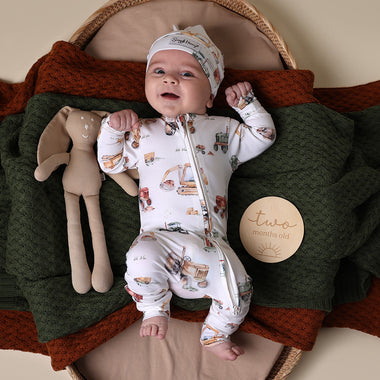 Baby wearing Diggers & Tractors Organic Snugglesuit Convertible Romper | Snuggle Hunny