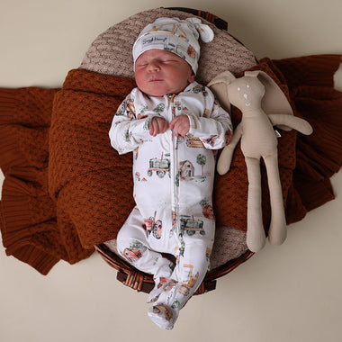 Baby wearing Diggers & Tractors Organic Snuggle Sleepsuit Zip Footie | Snuggle Hunny