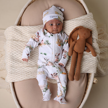 Baby wearing Farm Organic Snuggle Sleepsuit Zip Footie | Snuggle Hunny