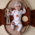 Baby wearing Lion Organic Snugglesuit Convertible Romper | Snuggle Hunny