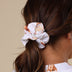 Woman wearing Lion Organic Scrunchie | Snuggle Hunny