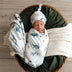 Baby wrapped in Ocean Organic Jersey Wrap & Beanie | Snuggle Hunny