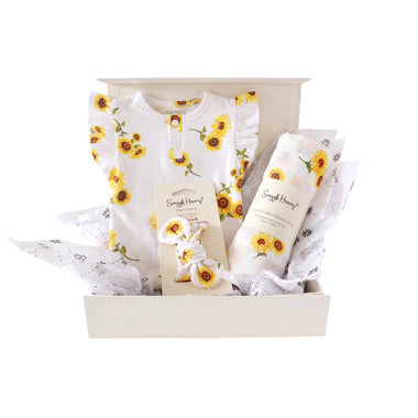 Snuggle Hunny Classic Sunflower gift hamper in a cream gift box with organic frill bodysuit, topknot and print muslin wrap