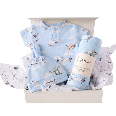 Snuggle Hunny Classic Taking Flight gift hamper in a cream gift box with organic bodysuit, knotted beanie and print muslin wrap